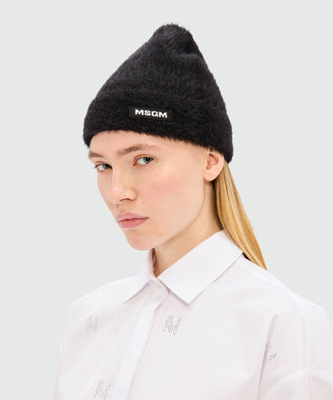 Black knitted hat with MSGM logo label