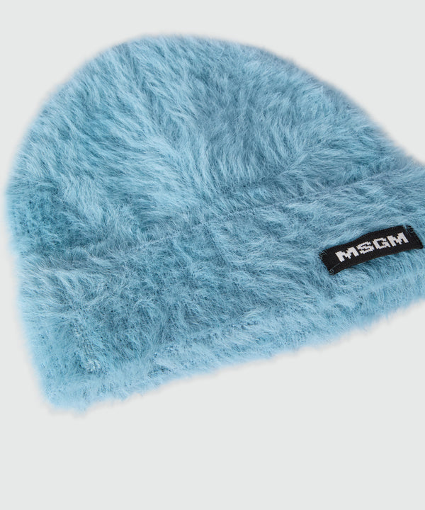 Light blue knitted hat with MSGM logo label