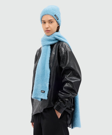Light blue knitted hat with MSGM logo label