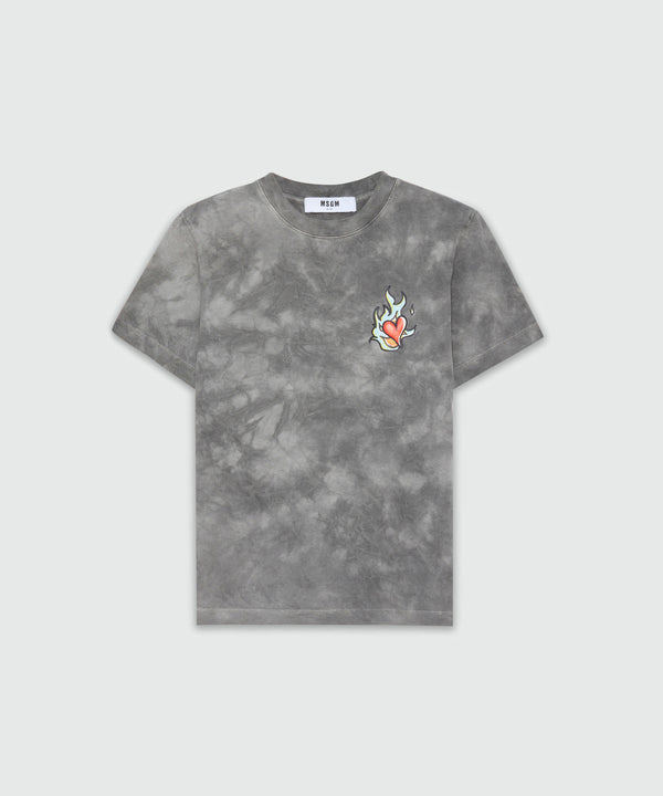 T-shirt grigia in jersey tie-dye con stampa MSGM "Heart on fire"