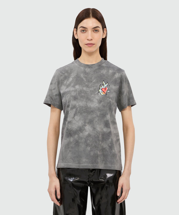 T-shirt grigia in jersey tie-dye con stampa MSGM "Heart on fire"