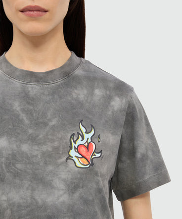 T-shirt grigia in jersey tie-dye con stampa MSGM "Heart on fire"