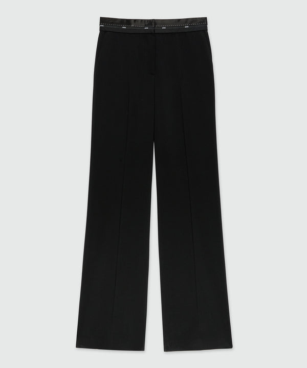 Black palazzo trousers in cool wool with logo belt