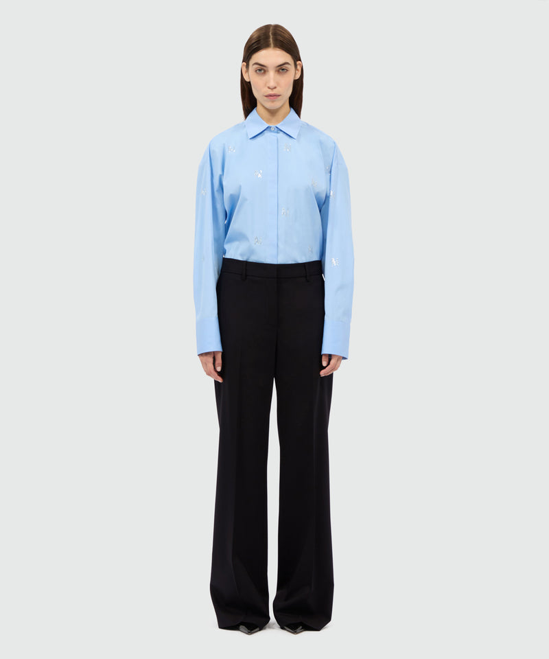 Pantaloni flare neri in fresco lana 99 Donna 