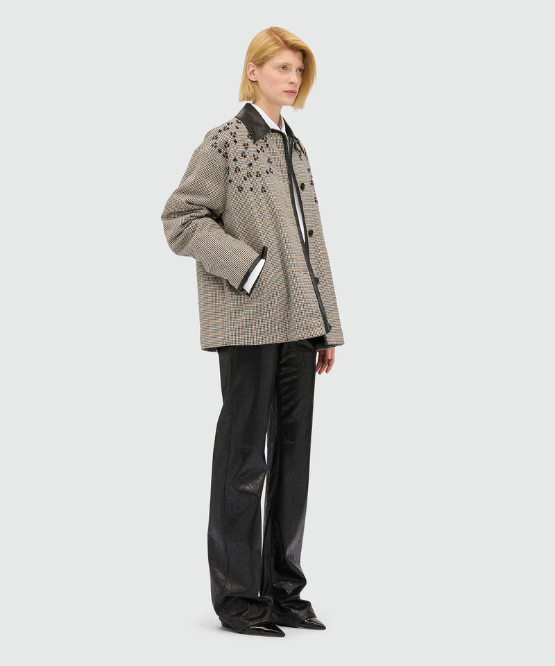 Pantaloni flare neri in similpelle craquelé 99 Donna 