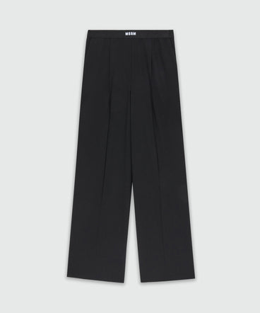 Black palazzo trousers in cool wool with elastic band and MSGM logo