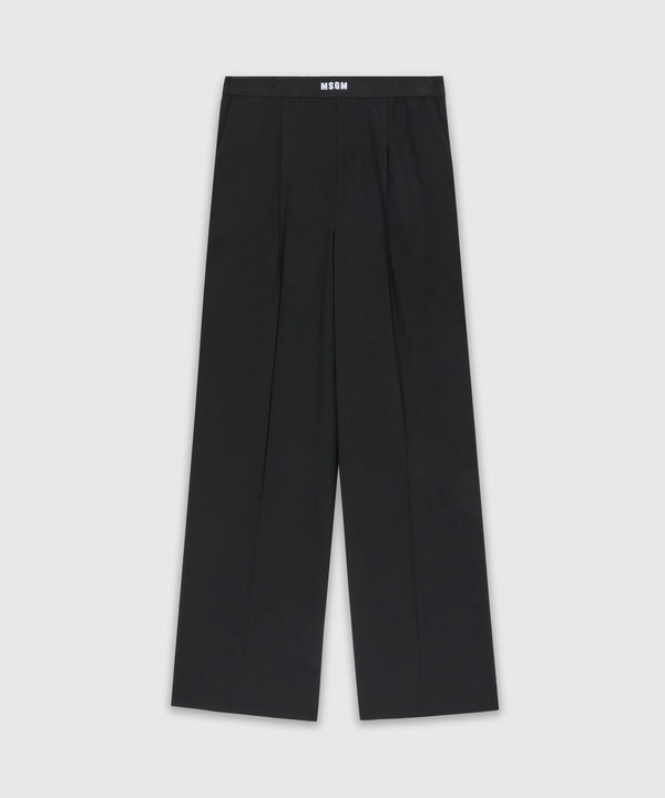 Black palazzo trousers in cool wool with elastic band and MSGM logo