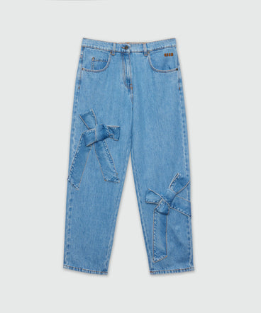 Blue denim trousers with bow detail