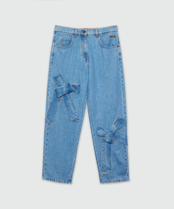 Blue denim trousers with bow detail