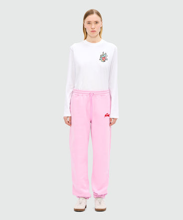 Pink joggers with "Follow the Rabbit®" embroidery