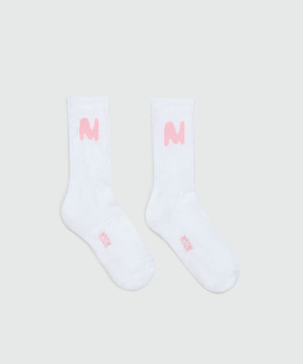 White socks with "TheMwave" jacquard graphics