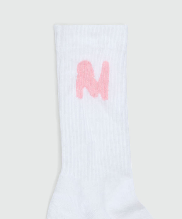 White socks with "TheMwave" jacquard graphics