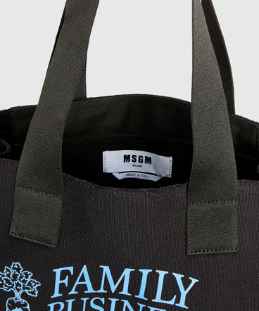 Black canvas tote with "Family Business" print