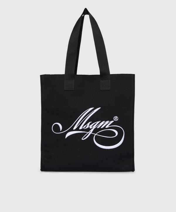 Black canvas tote with white cursive MSGM logo
