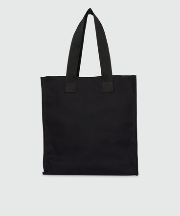 Black canvas tote with white cursive MSGM logo