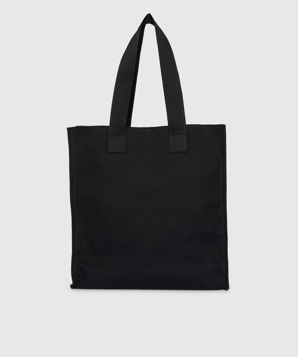 Black canvas tote with white cursive MSGM logo