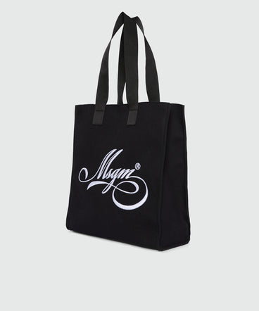 Black canvas tote with white cursive MSGM logo