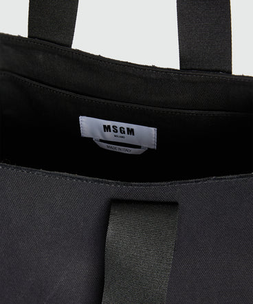 Black canvas tote with white cursive MSGM logo