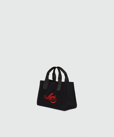 Black canvas micro tote with red cursive MSGM logo