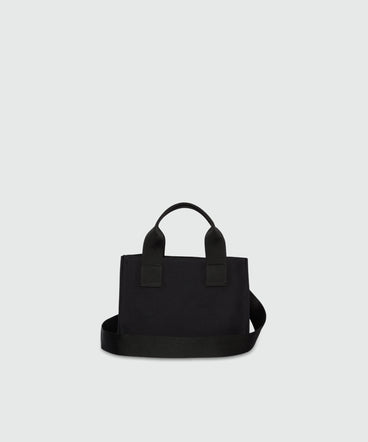 Black canvas micro tote with white cursive MSGM logo