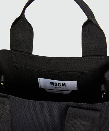 Black canvas micro tote with white cursive MSGM logo