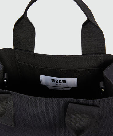 Black canvas micro tote with "TheMwave" logo