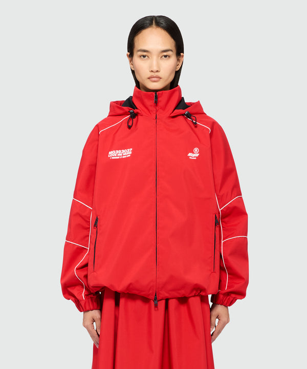 Giubbino rosso in nylon con piping a contrasto