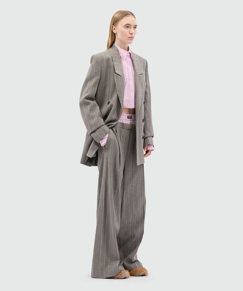 Wide-leg trousers in light wool with a pinstripe pattern in grey melange with elastic. 97 Women 