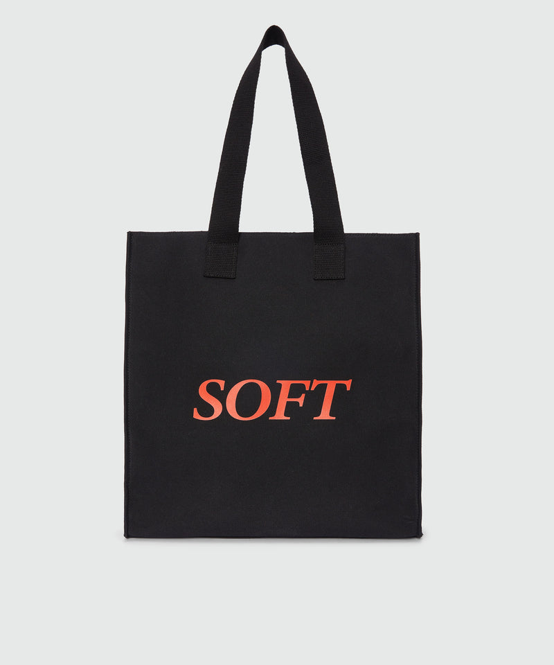 Black canvas tote with "Soft" print and lettering 99 Women 