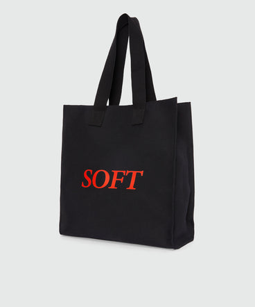 Black canvas tote with "Soft" print and lettering