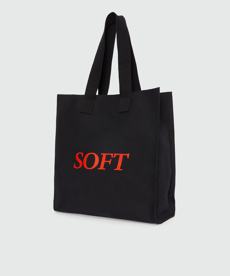 Black canvas tote with "Soft" print and lettering 99 Women 