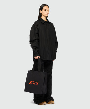 Black canvas tote with "Soft" print and lettering