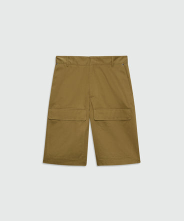 Military green cotton gabardine Bermuda shorts with wide legs and patch pockets on the leg.