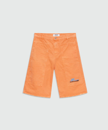 Orange cotton canvas Bermuda shorts with enzyme wash