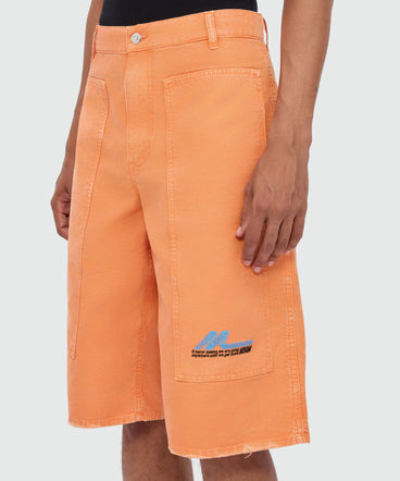 Orange cotton canvas Bermuda shorts with enzyme wash