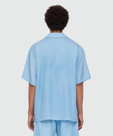 Light blue bowling short-sleeve lyocell shirt with tie-dye effect and embroidered logo on the chest