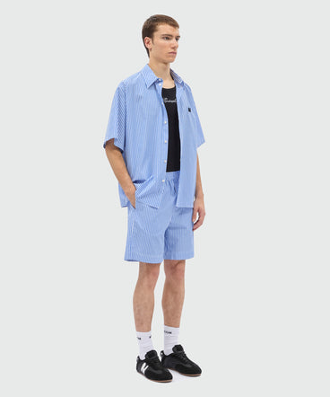 Light blue striped cotton poplin short-sleeve shirt with classic collar and front patch