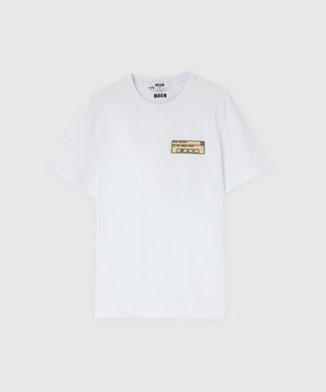 White long-sleeve cotton jersey T-shirt with patch on the chest.