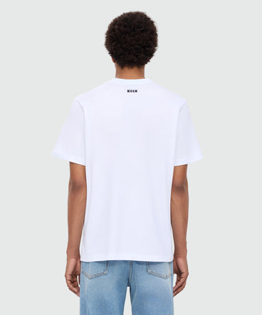 White long-sleeve cotton jersey T-shirt with patch on the chest.