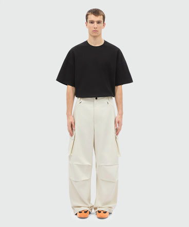 Ice grey cotton gabardine trousers with patch pocket detail on the leg