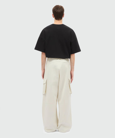 Ice grey cotton gabardine trousers with patch pocket detail on the leg