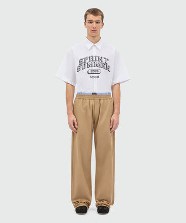 Beige wide-leg cotton gabardine trousers with double elasticated waistband