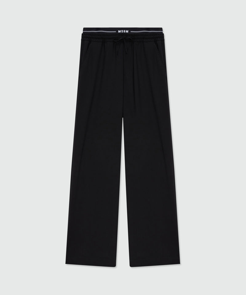 Black wool trousers with logo elasticated waistband 99 Uomo 