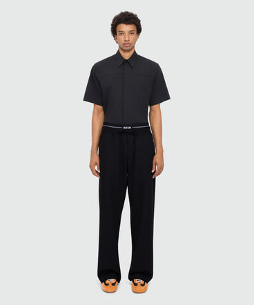 Black wool trousers with logo elasticated waistband