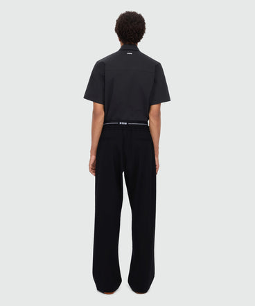Black wool trousers with logo elasticated waistband