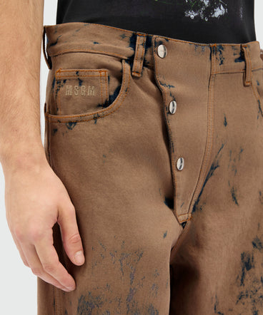 Beige washed denim five-pocket trousers