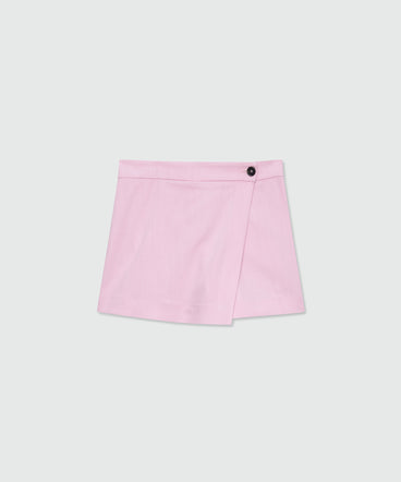 Pink viscose-blend canvas shorts with wrap closure and visible button