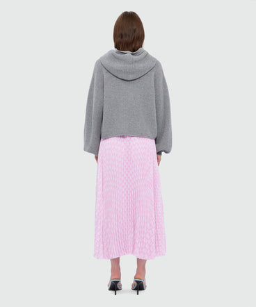 Pink pleated soleil skirt with all-over MWAVE logo print