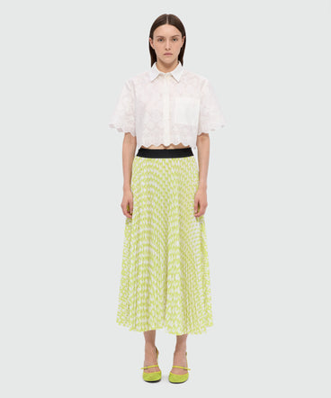Lime pleated soleil skirt with all-over MWAVE logo print