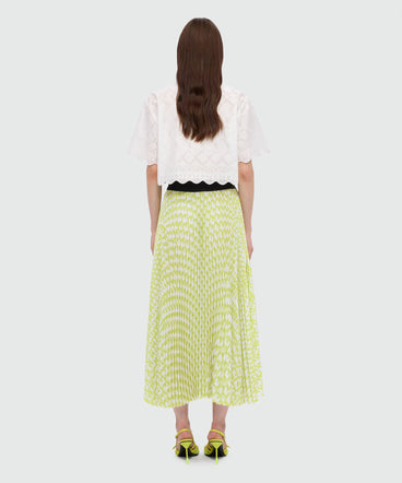 Lime pleated soleil skirt with all-over MWAVE logo print